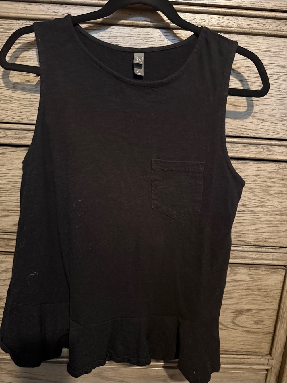 Alya Black Sleeveless Tank with Pocket and Peplum Hem